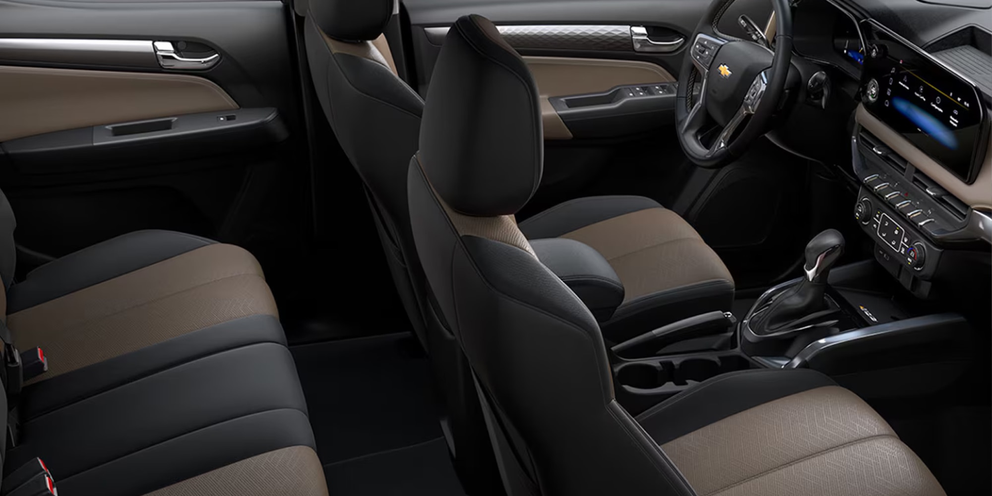 Vista interior Chevrolet Colorado, asientos delanteros, volante y pantalla digital